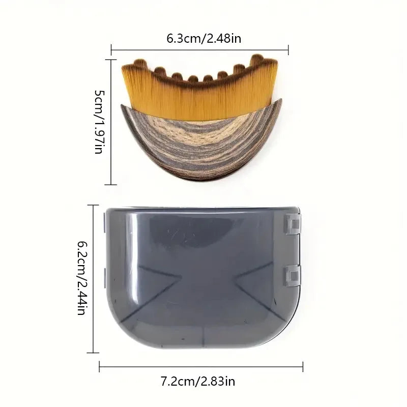 Crescent-shaped face contour brush with wood-grain handle, soft brown bristles, and gray protective storage case.