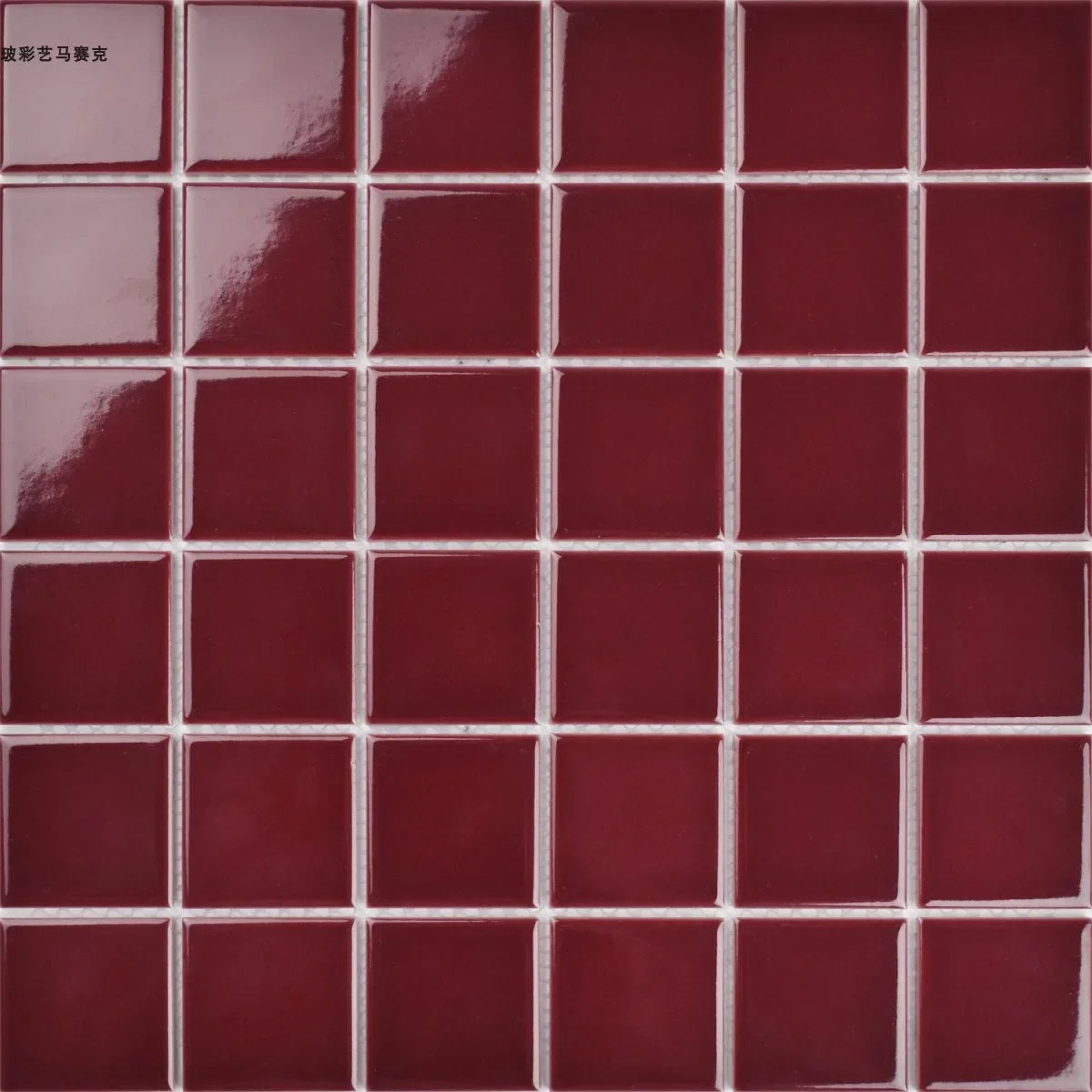 Ceramic mosaic tile sheet with dark red squares and light grout lines