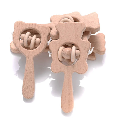 Light brown natural wood rattle teething toy for baby.