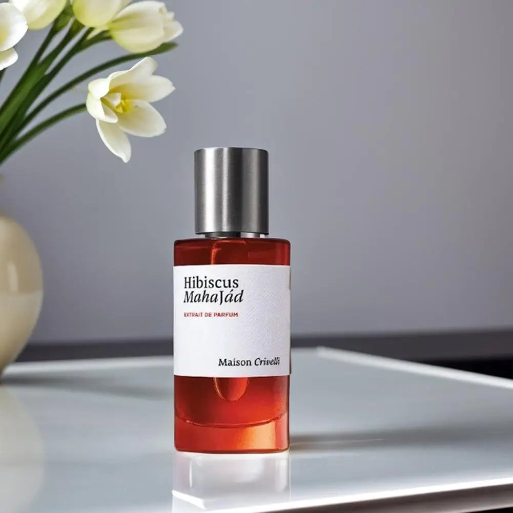 Maison Crivelli Hibiscus Mahajad Extrait de Parfum: unisex amber floral fragrance in a cylindrical glass bottle.
