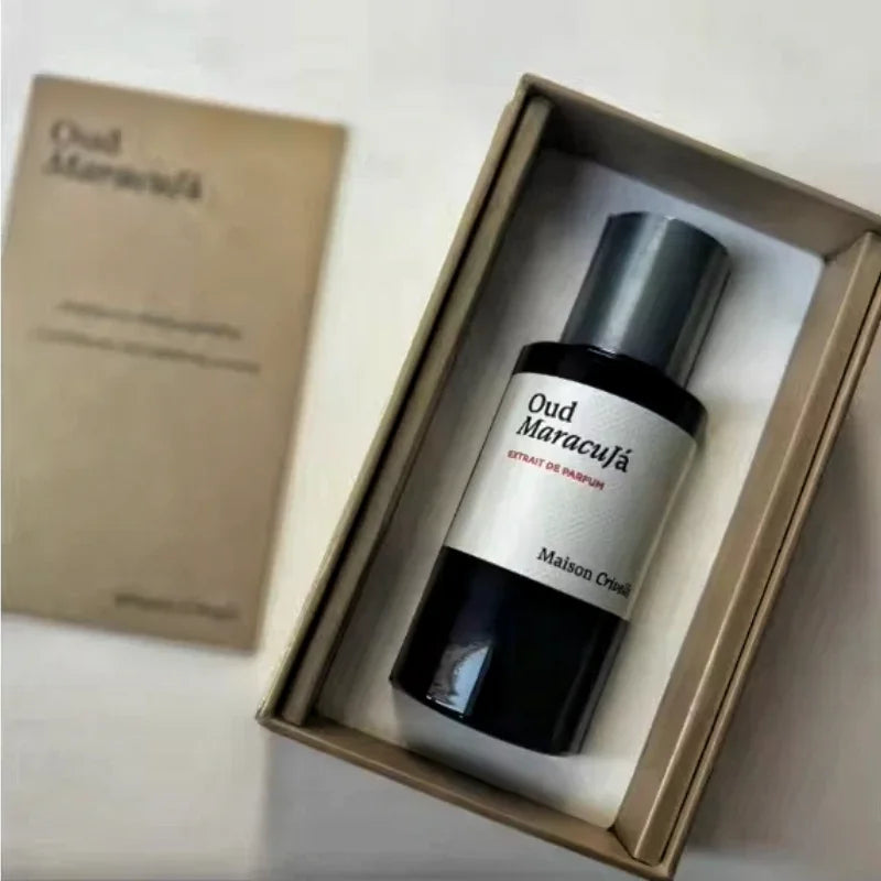 Maison Crivelli Oud Maracuja Extrait de Parfum: unisex black cylindrical bottle, luxury Arabic niche fragrance spray.