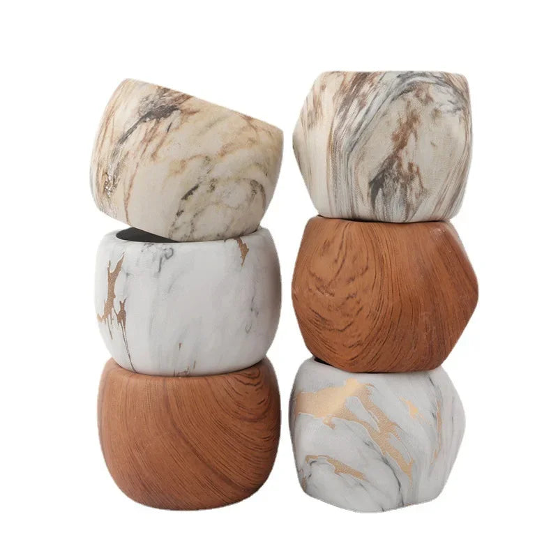 Ceramic succulent pots, marble white and wooden-brown, stacked in a pair arrangement