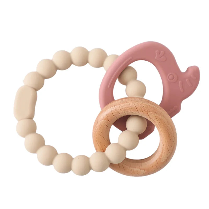 Beige and pink silicone and natural wood baby teething ring toy for infant relief.