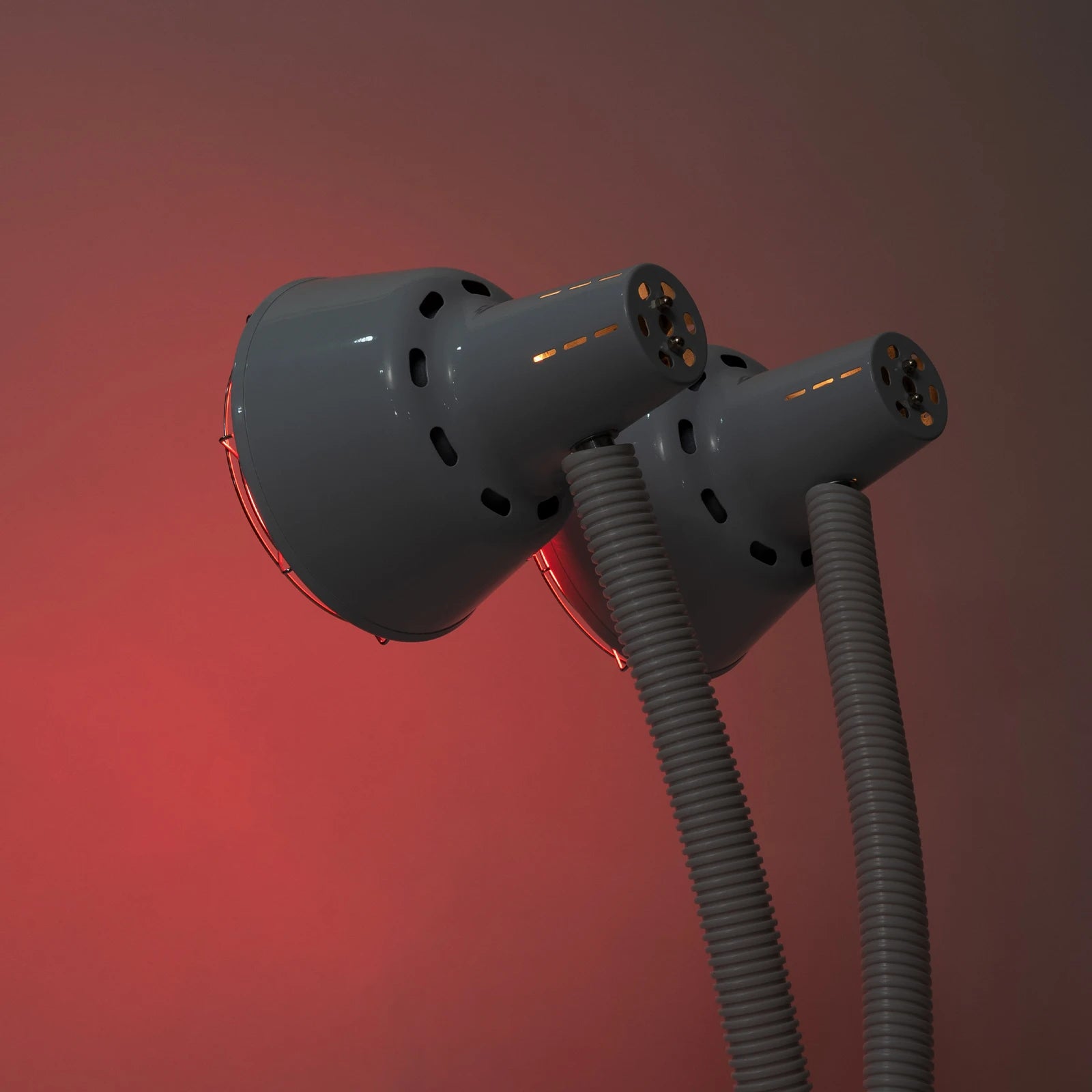 Double-headed 275W infrared heat lamp with adjustable necks for pain relief and salon use on a gradient background.