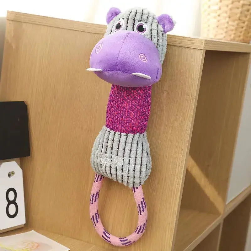 Purple hippo plush dog chew toy with rope for interactive play and dental cleaning. Cute squeaky puppy training toy.