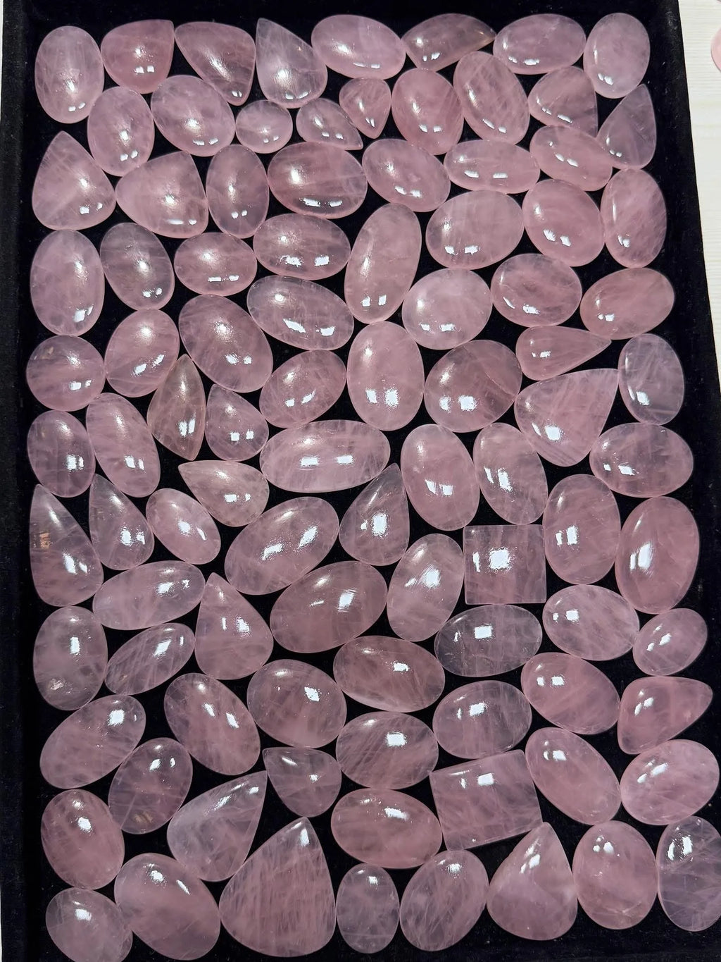 Rose quartz cabochon loose stones, light pink oval and teardrop shapes, polished surface