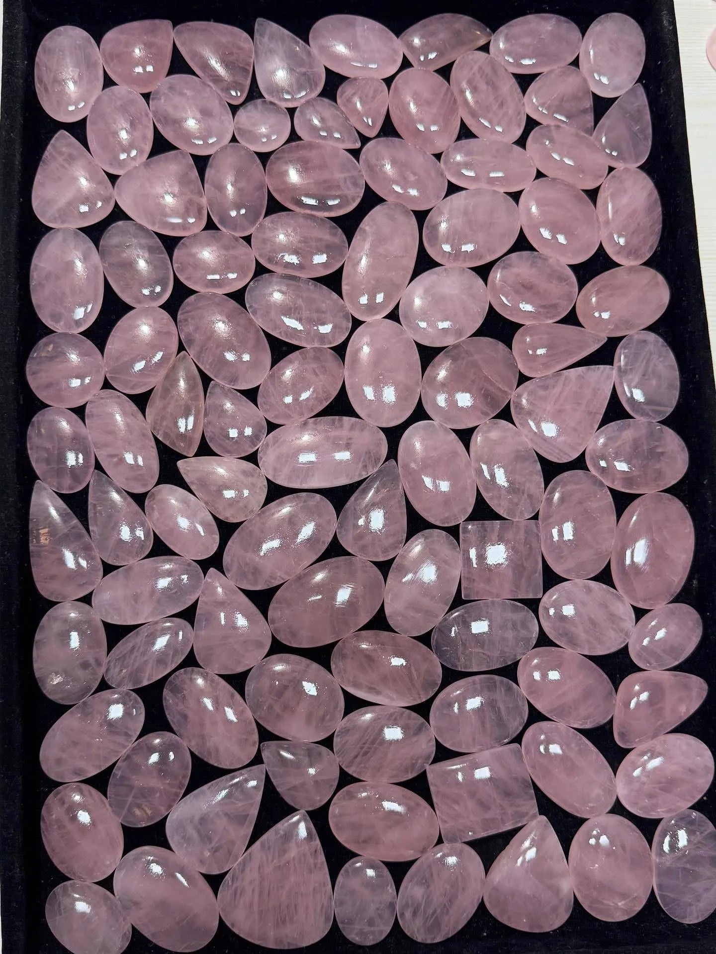 Rose quartz cabochon loose stones, light pink oval and teardrop shapes, polished surface