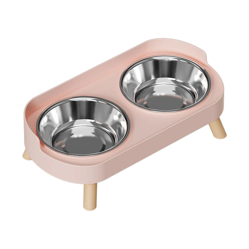 Elevated pink dual pet bowl with stainless steel inserts for ergonomic, anti-slip feeding for cats and dogs.