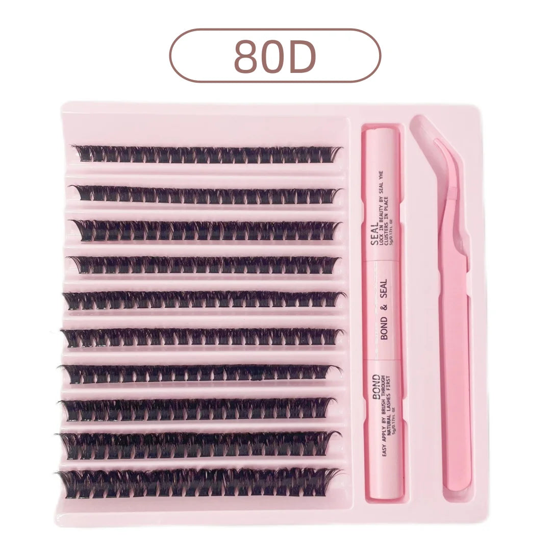 DIY lash kit in pink tray with black cluster lashes, 80D style, bond and seal duo, and pink applicator tweezers.