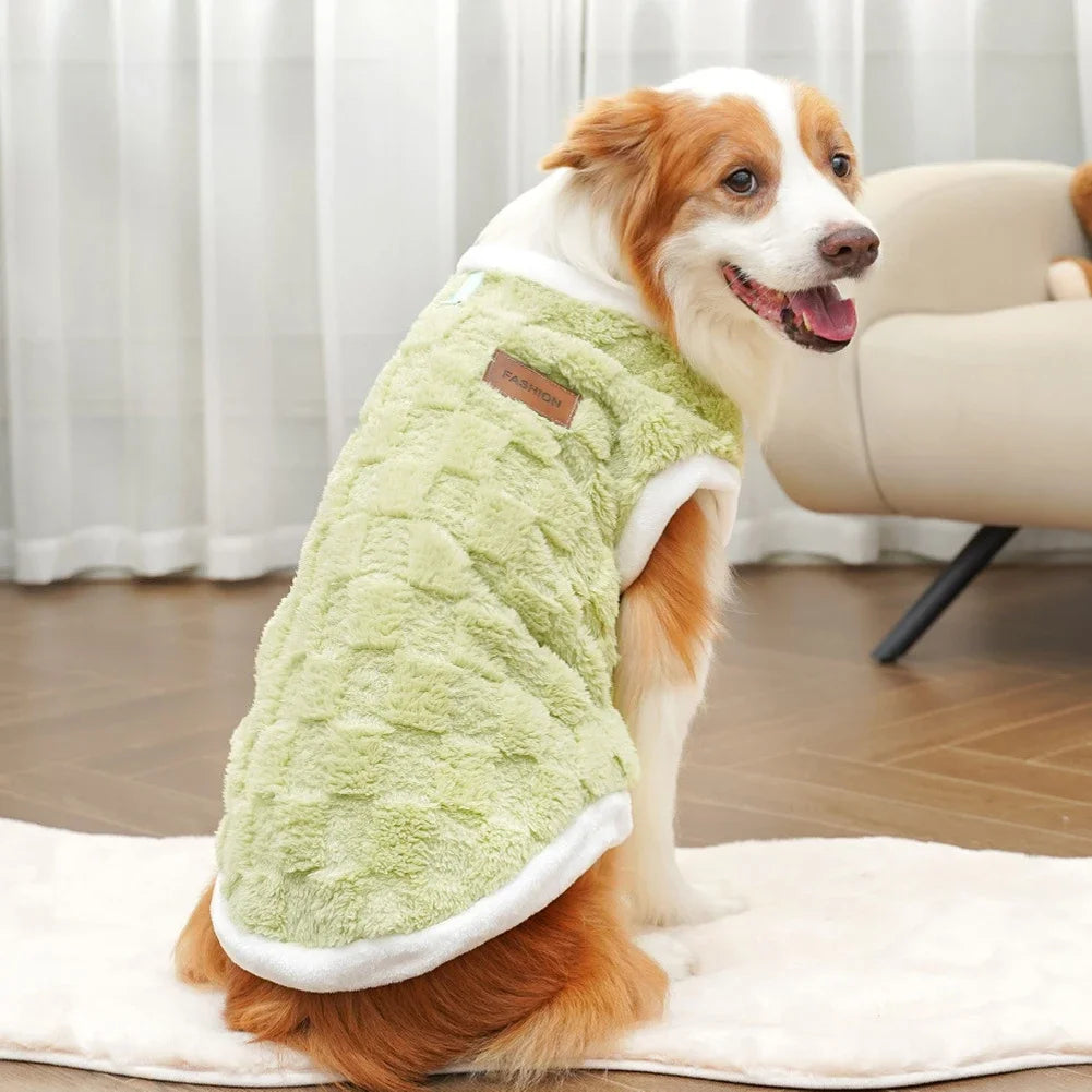 Dog wearing a soft, sage green fleece winter sweater vest, perfect for keeping small to large pets warm and cozy.