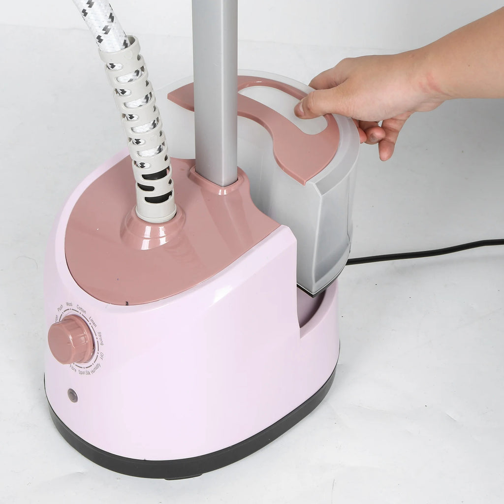 Tidesmit light pink standing garment steamer featuring dual flat and hanging ironing modes for home laundry care