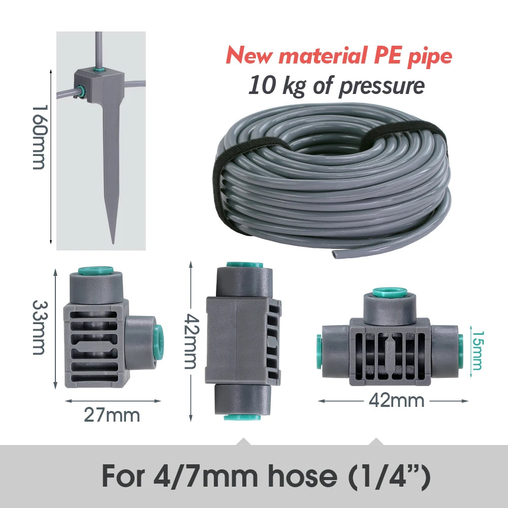 Gray garden misting hose coil with quick-connect Y-splitters and green cap fittings