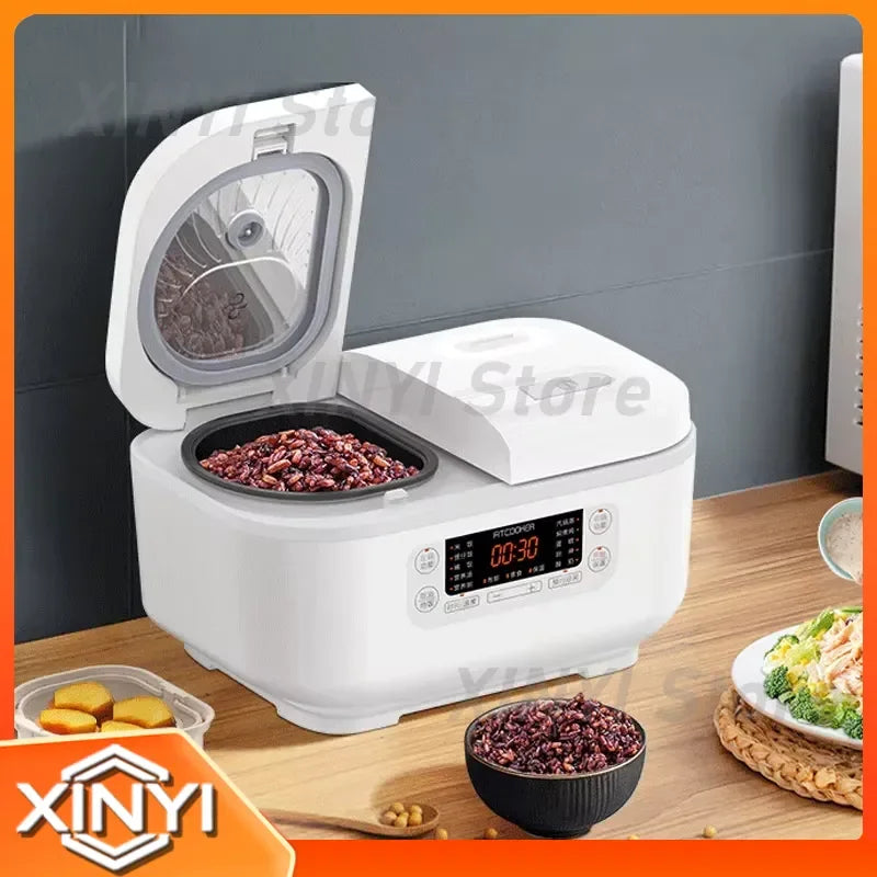 White mini smart rice cooker with open lid and single inner pot filled with food