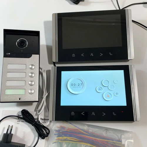 7-inch indoor video intercom monitor with screen, control buttons, and wiring terminals