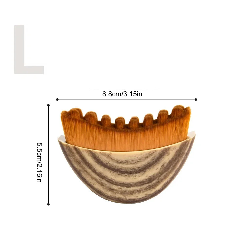 Curved facial massage brush with brown bristles and a textured, wood-patterned handle, shown with dimension labels.