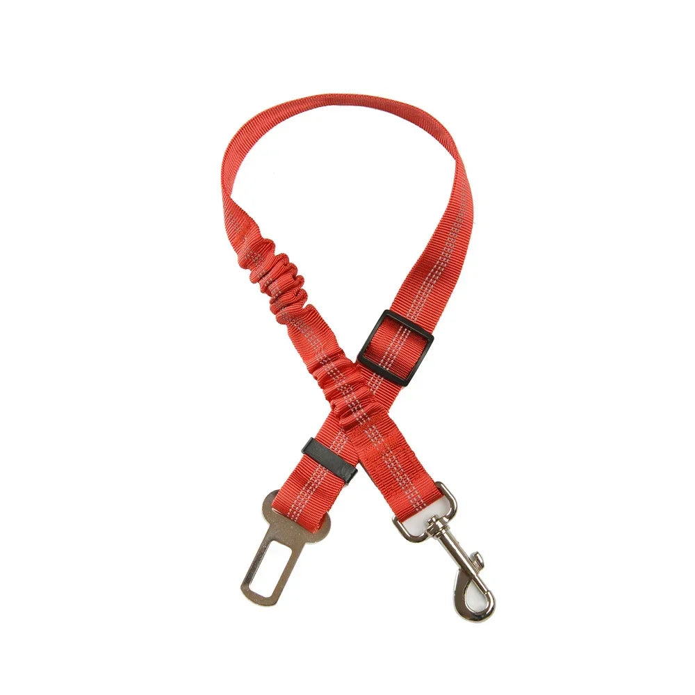 Red adjustable, reflective elastic dog car seat belt safety harness for safe pet travel for all dog sizes.