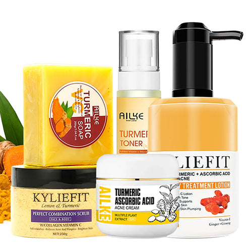 Turmeric skincare set with toner bottle, cream jar, lotion pump, scrub and soap bar
