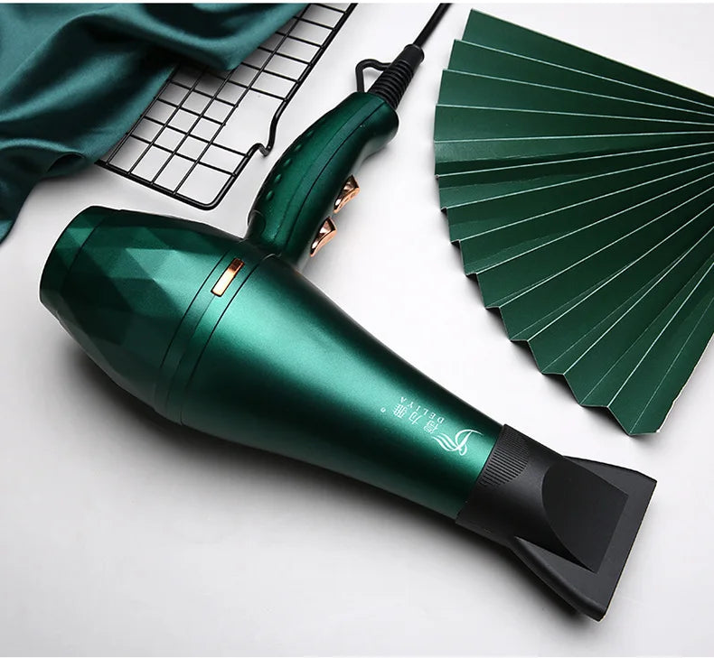 Emerald green professional hair dryer with concentrator nozzle for fast, constant temperature salon-style drying.