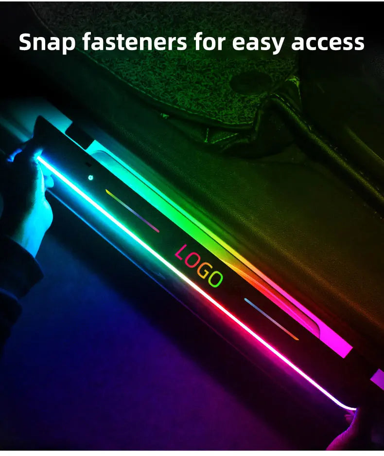 LED car door sill protector with multi-color lighting and snap-fastener mounting for interior threshold decoration.