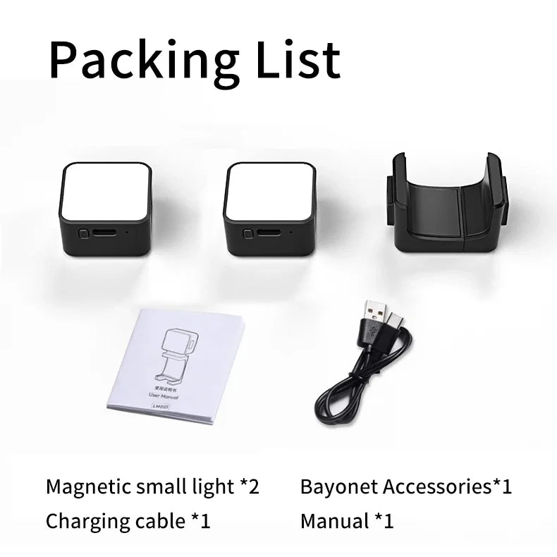 Two square black LED lights, a magnetic bayonet mount, USB charging cable, and user manual.