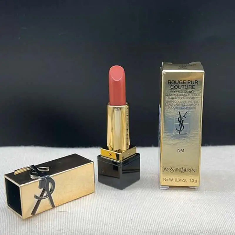 YSL Rouge Pur Couture mini lipstick in Nu Muse: a moisturizing, satin-finish nude shade in gold packaging.