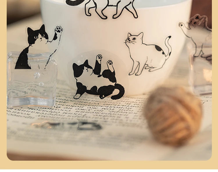 Cute cartoon cat PET stickers for DIY scrapbooking, journals, and crafts. Clear adhesive decals for cat lovers.
