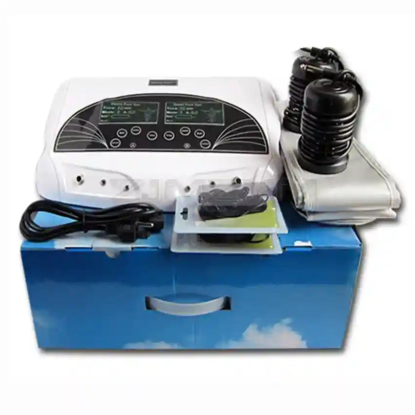 Dual ionic detox foot spa machine with LCD control unit, two black ion arrays, and far infrared heating belts in box.
