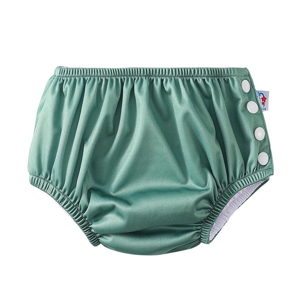 Green reusable baby cloth diaper cover with side snap buttons for adjustable fit.