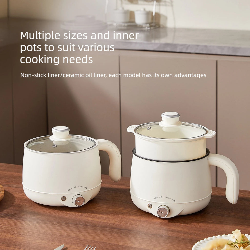 Two white electric hot pots with lids and side handles on a countertop