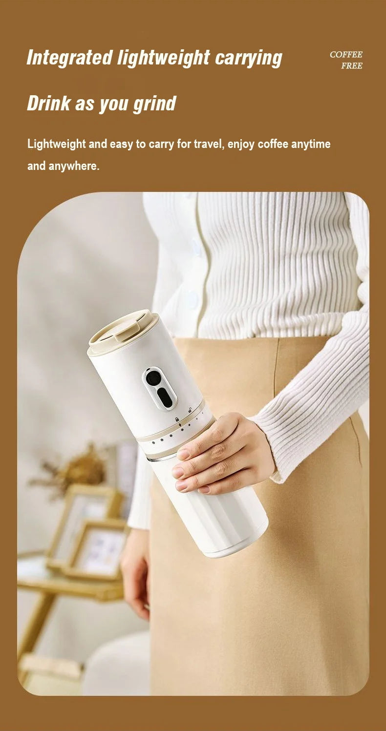 Portable white electric coffee grinder and mug with a beige lid, held by a woman for on-the-go travel brewing.
