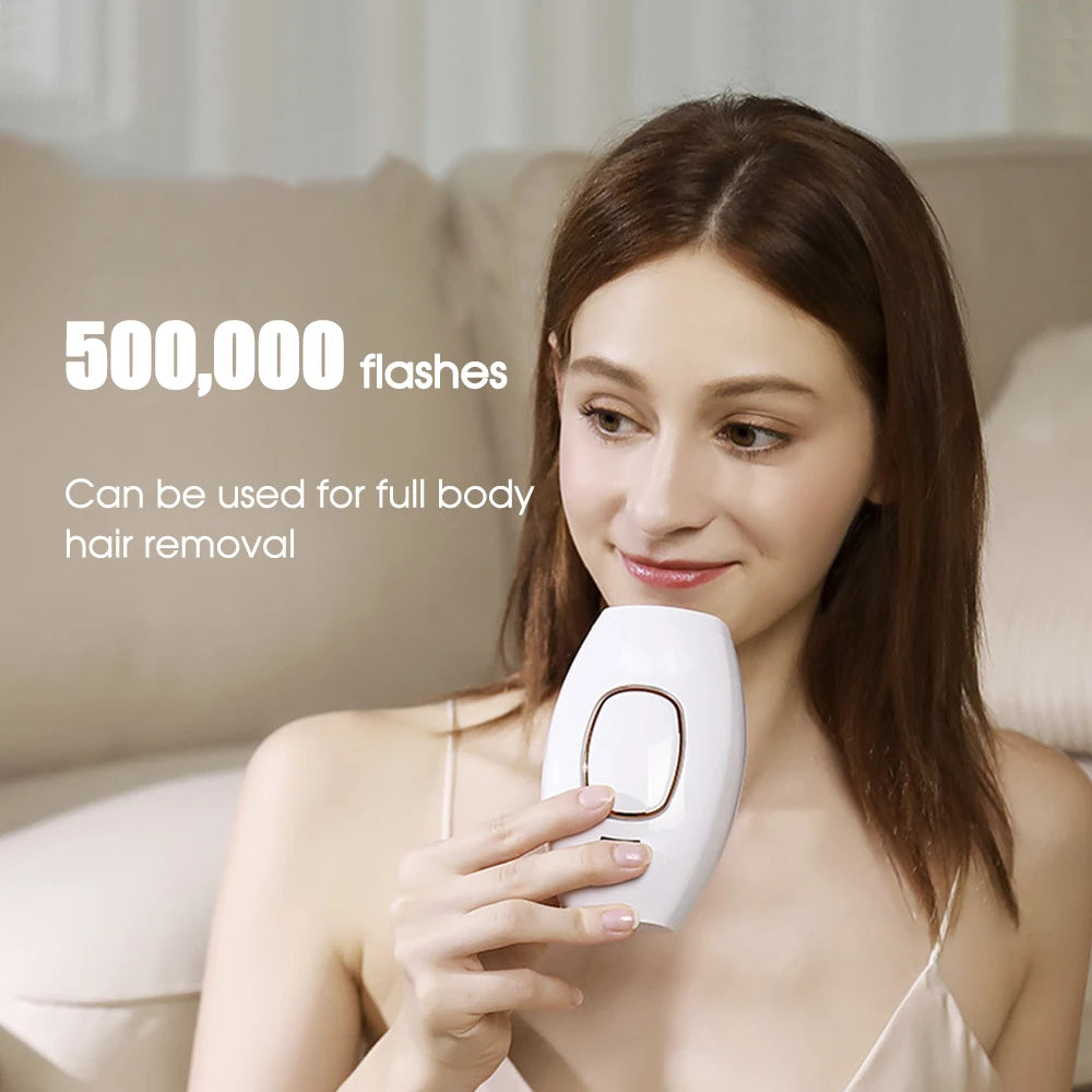Woman holding a white, portable IPL hair removal device with 500,000 flashes for painless, full-body home hair removal.