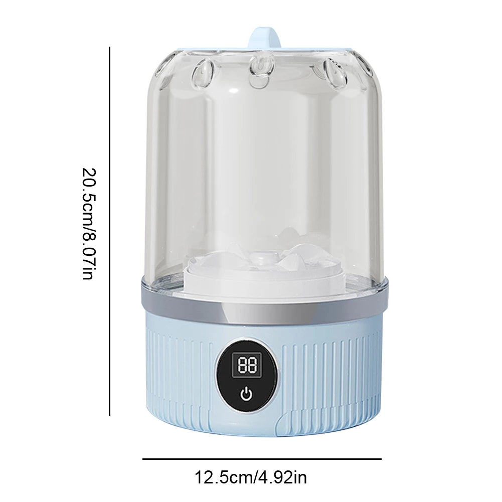 Blue automatic shoe washing machine with dimensions shown, clear dome and front power button.