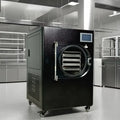 Commercial freeze dryer machine with digital display in a lab.