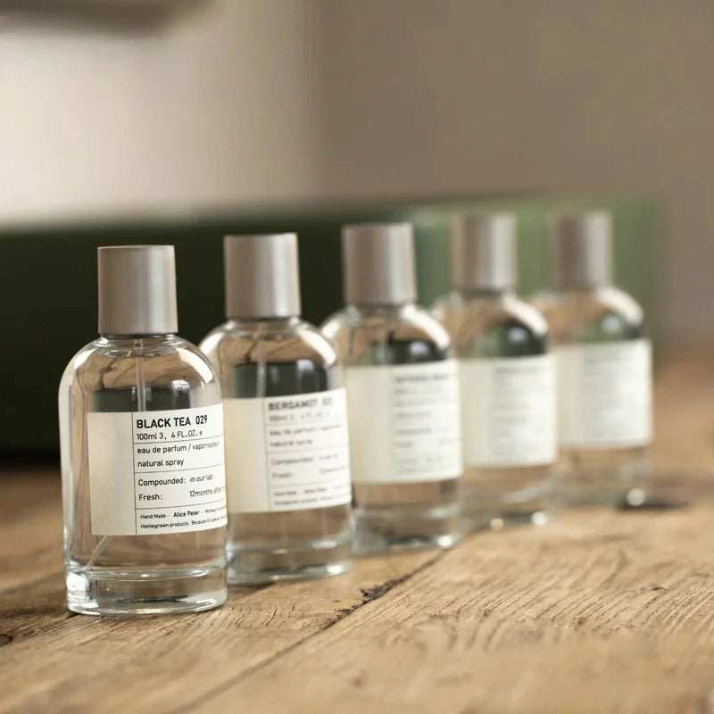 Alice Peter 100ml unisex Eau de Parfum. Round glass bottle, sandalwood, bergamot, fresh fruity scent for men & women.