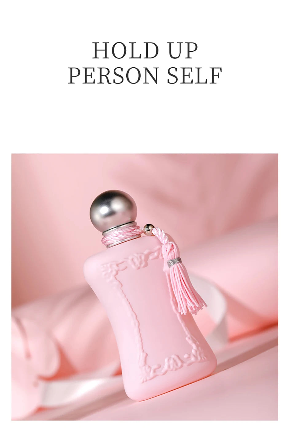 Luxury 75ml EDP women's floral perfume in a matte pink bottle with tassel detail and silver cap. Long-lasting scent.