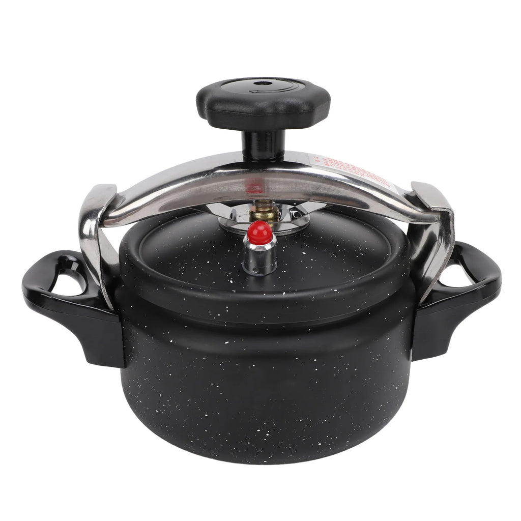 Black speckled pressure canner with domed lid, steam valve, and side handles