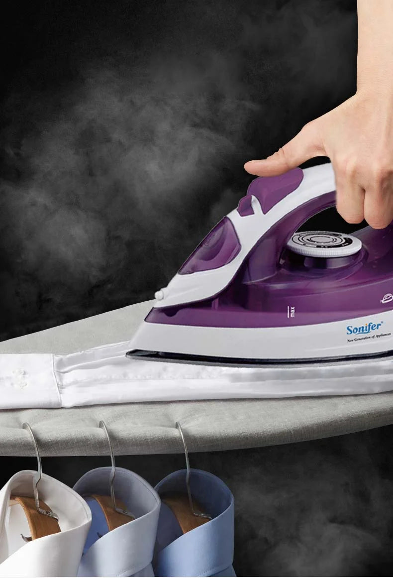 Tidesmit portable mini garment steamer featuring an adjustable ceramic soleplate for efficient travel clothing ironing