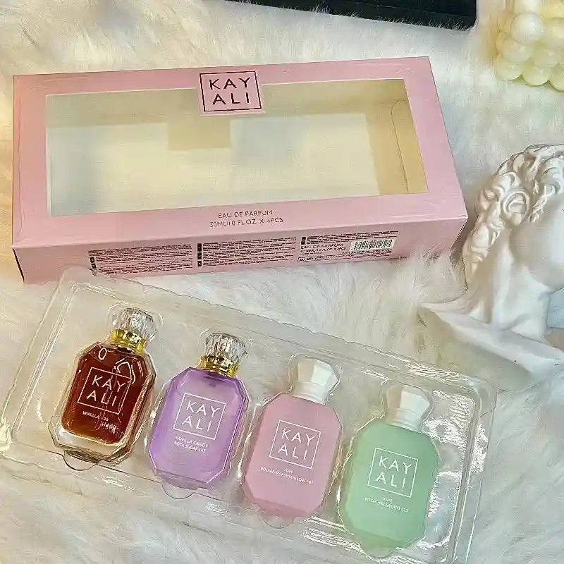 KAYALI unisex travel perfume set: 4x30ml EDP mini bottles with sweet vanilla & oriental fragrance notes in luxury box.