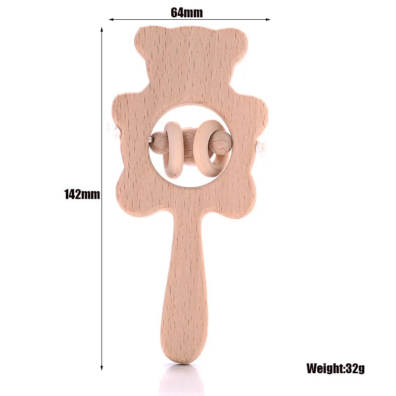 Natural wood bear teething toy and rattle in beige for baby teething relief.