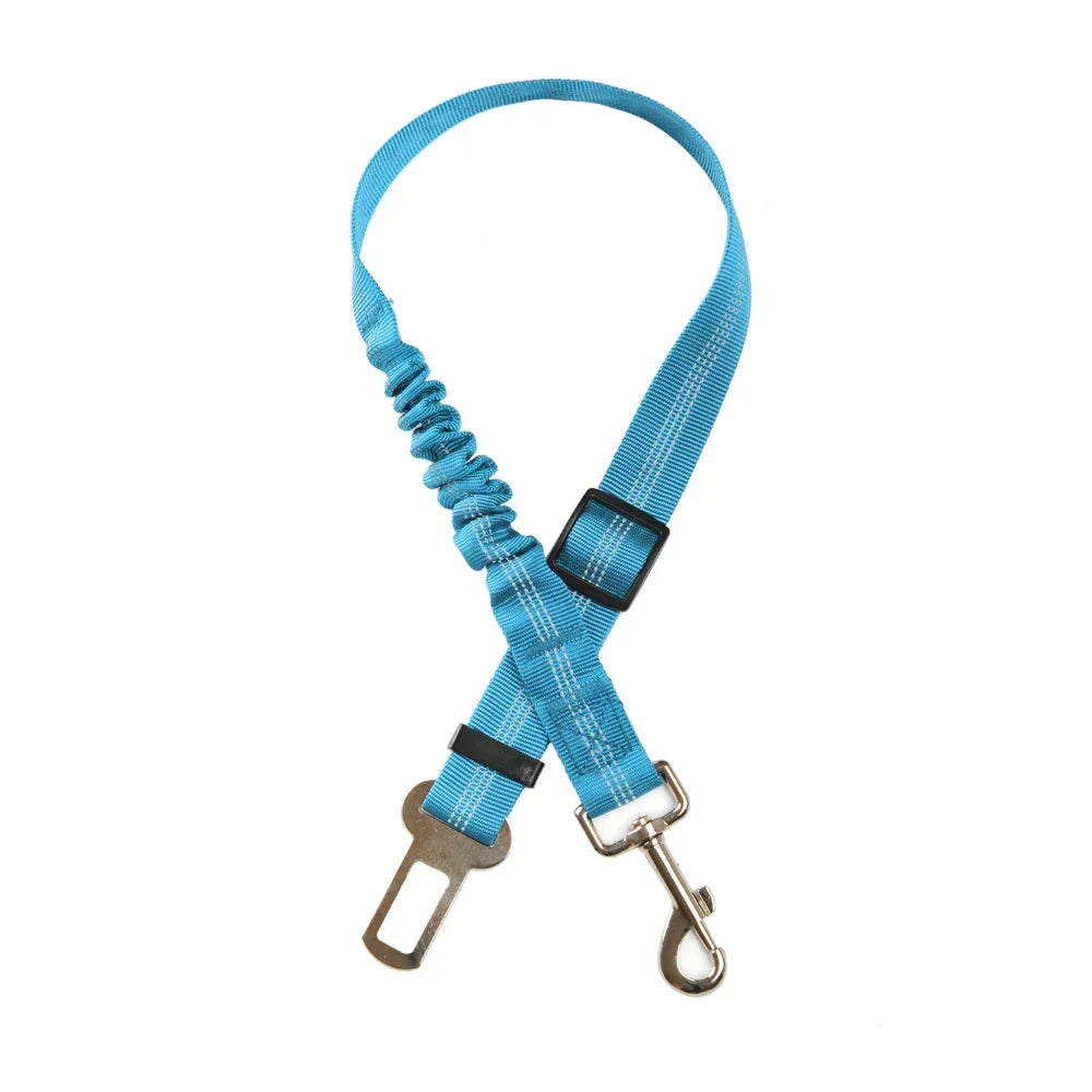 Blue adjustable reflective dog car seat belt with elastic shock-absorbing leash for safe pet travel.