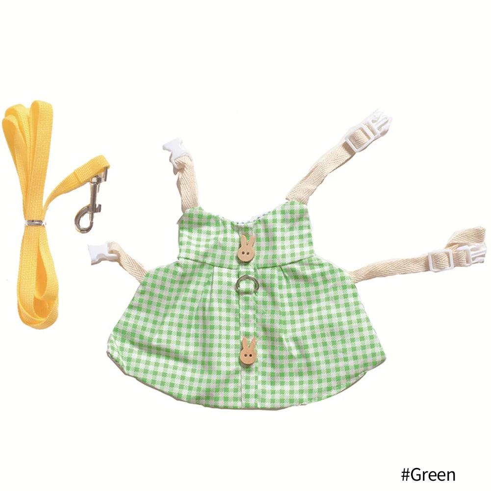 Green gingham rabbit harness dress with yellow leash for comfortable outdoor walks for bunnies and guinea pigs.