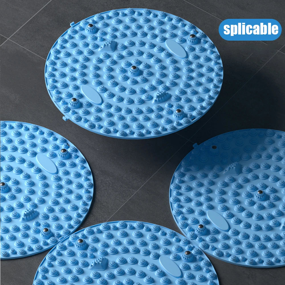 Blue round acupressure foot massage mats with textured nodes and metal spheres for reflexology and yoga training.