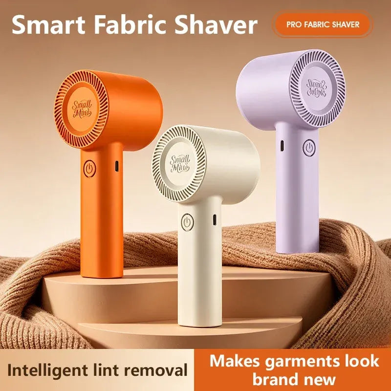 Smart fabric shaver for intelligent lint removal, shown in orange, cream, and purple on a knit sweater.