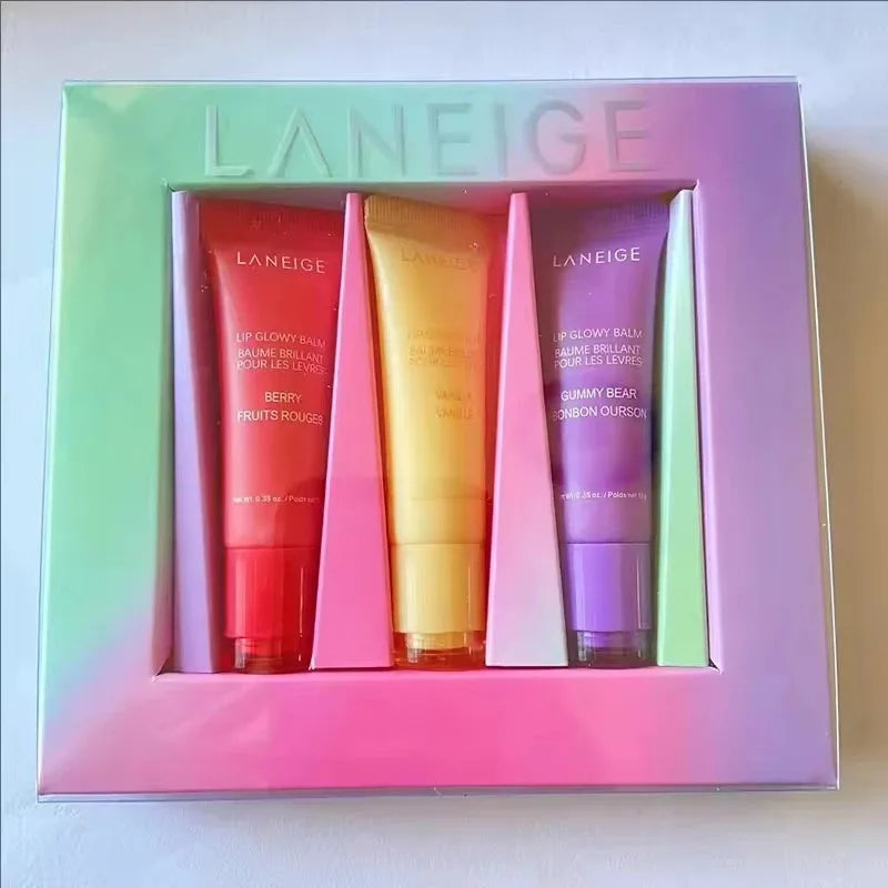 Laneige Lip Glowy Balm trio set featuring hydrating, colorful tinted lip treatment tubes in Berry, Vanilla, and Gummy Bear.