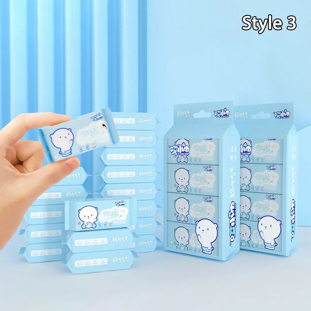 Blue baby care wipes pack with cute bear design, featuring multiple individual travel-sized wet wipe packets.