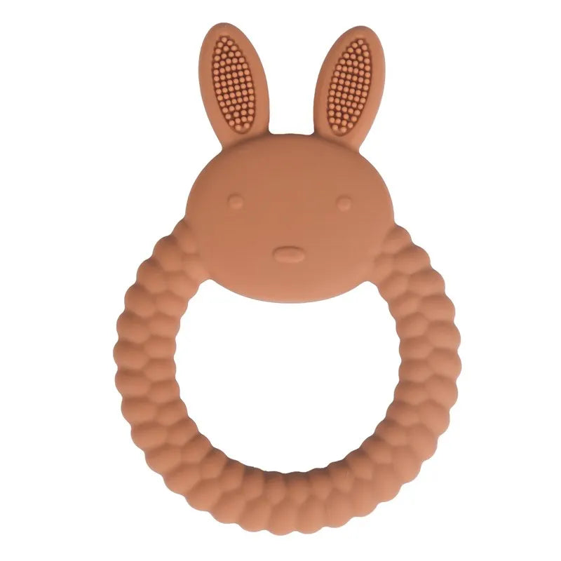 Brown silicone baby teething ring in a cute bunny shape for soothing infant sore gums.
