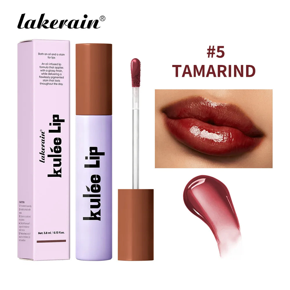 Lakerain Kulfée moisturizing lip oil in Tamarind #5. Non-sticky, glossy red-brown lip gloss with smooth applicator.