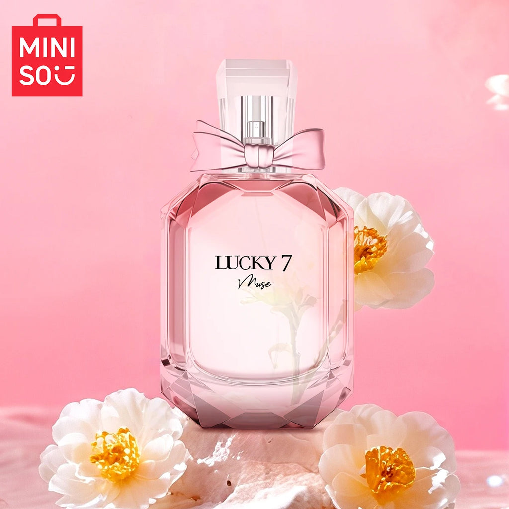 Miniso Lucky 7 Muse floral EDP for women: 100ml luxury perfume in a faceted glass bottle with a pink bow accent.