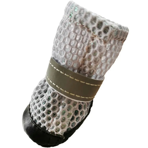 Breathable mesh dog shoe in light grey with tan strap and black non-slip sole