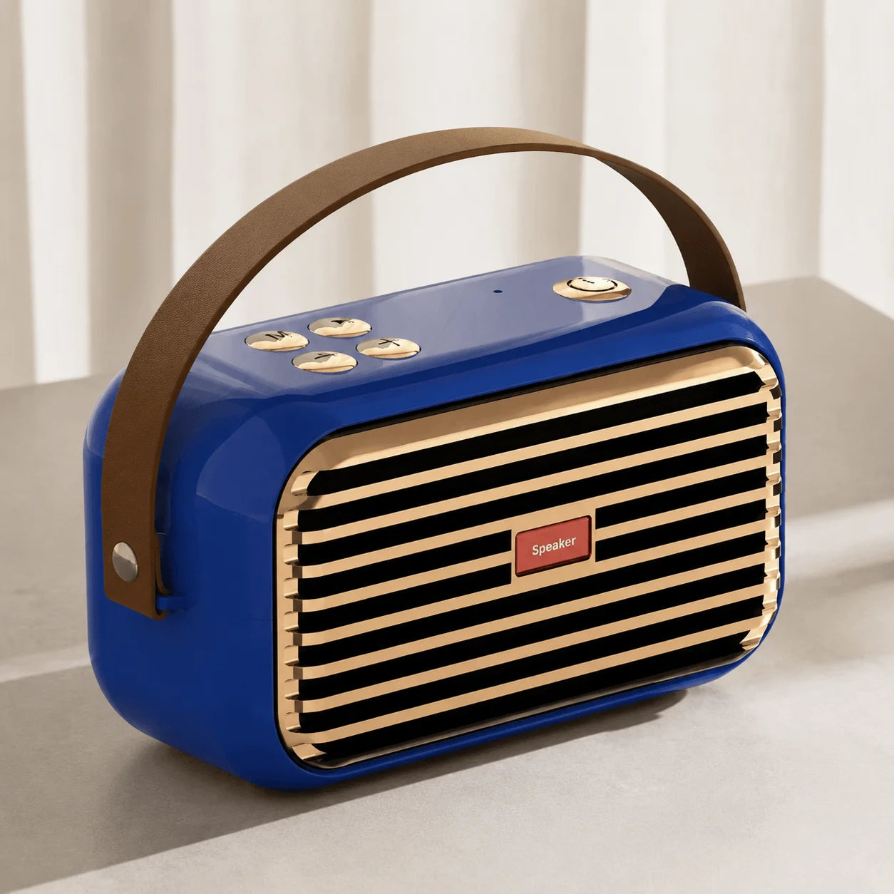 Blue portable Bluetooth speaker with carry handle and front speaker grille.